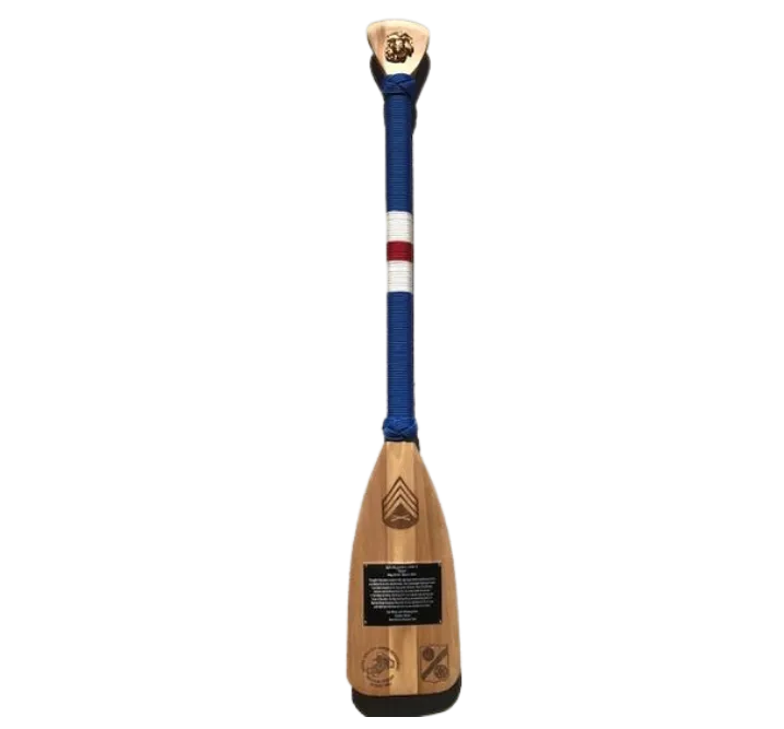 Paddle with red, white, and blue twining and sergeant badge engraving